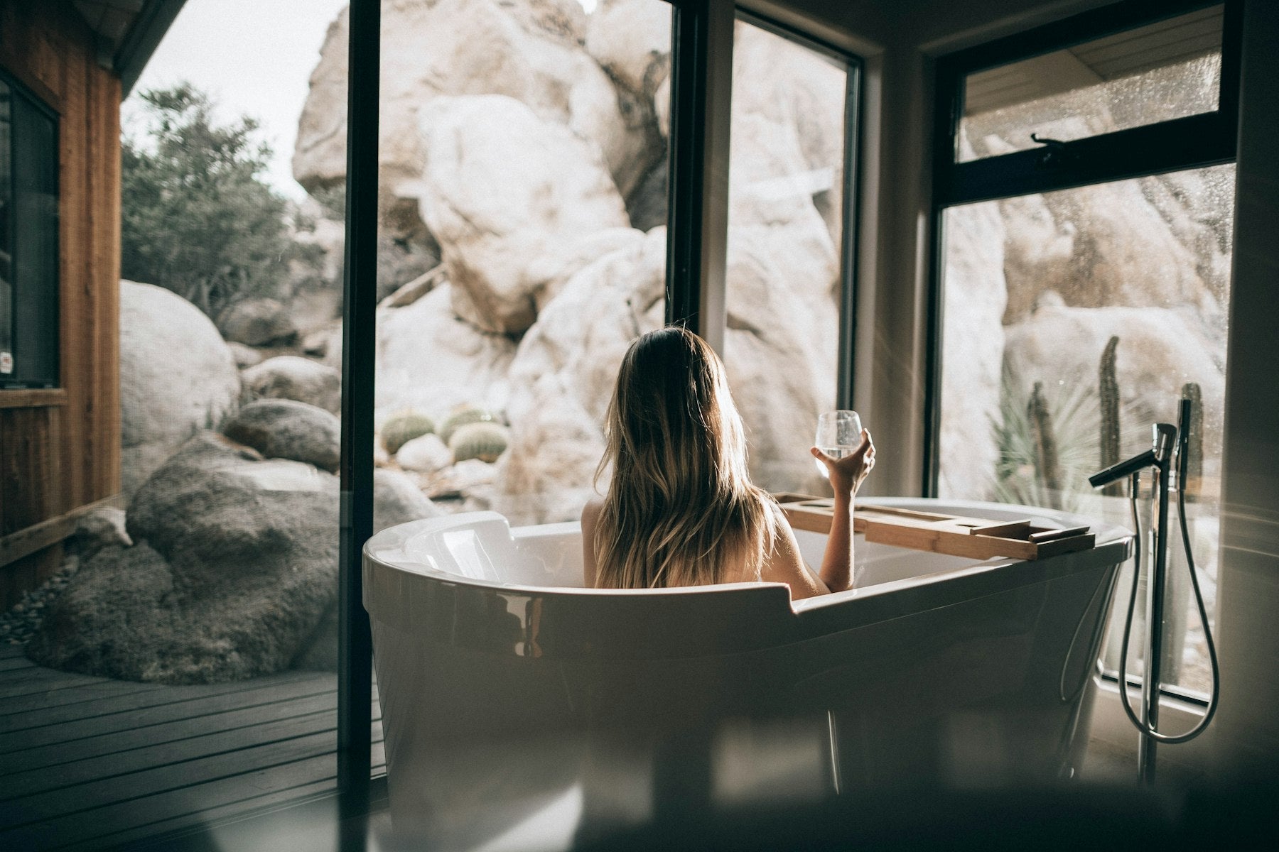 Woman relaxing in cool water at dusk