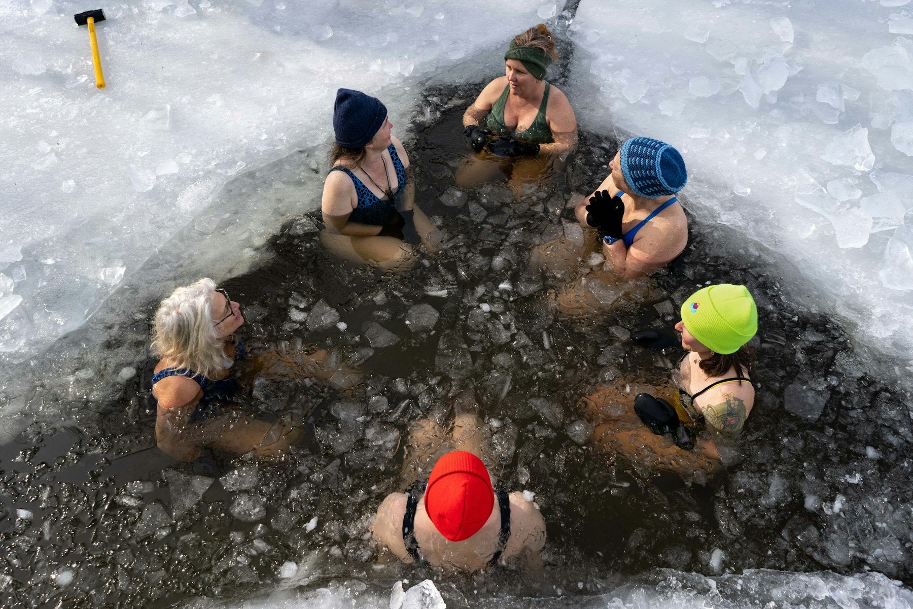 Person in a cold plunge for recovery